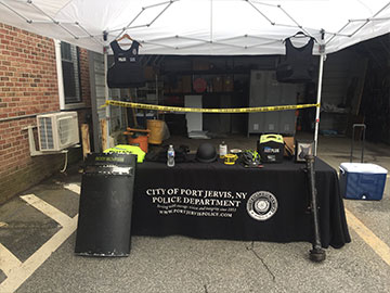 The Port Jervis Police booth with various pieces of equipment to show